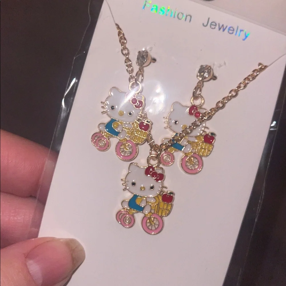 Hello Kitty bundle socks, necklace, earrings, zipper pull, coin purse nwt